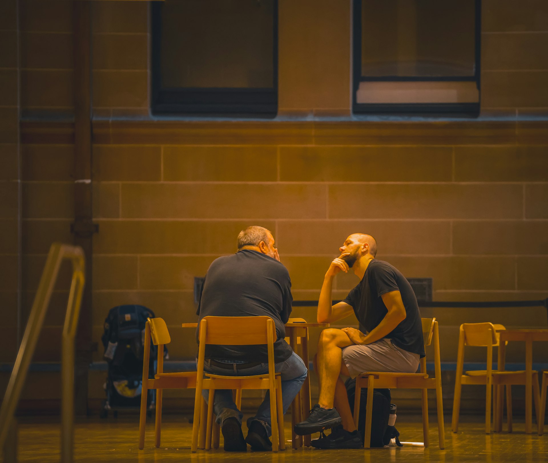 Two men in conversation